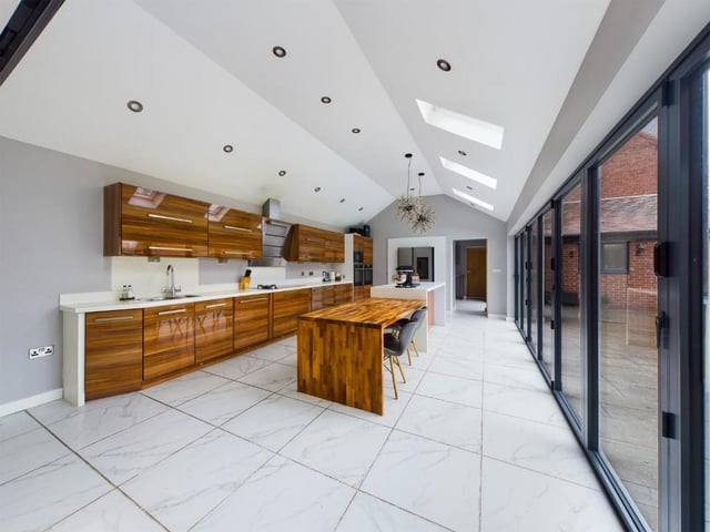 An alternative view of the kitchen with a central island.