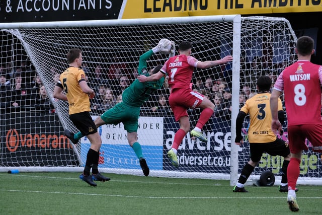 The visiting keeper claims a deep cross from the left, ahead of Boro skipper Michael Coulson.