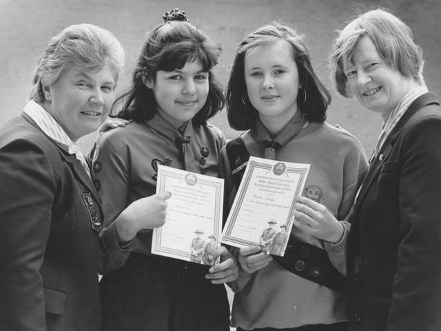 Back in April, 1992, Michelle Suri, second left, and Claire Bishop, of the 2nd Scarborough Guides were presented with their Trefoil awards by their Guider Cecily Burnley, left and Assistant Guider Dorothy Stockill. 