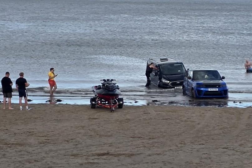 Video shows moment Range Rover and Transit van submerged by tide on ...