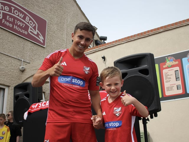 Boro first-teamer Lewis Maloney modelled the new home kit.