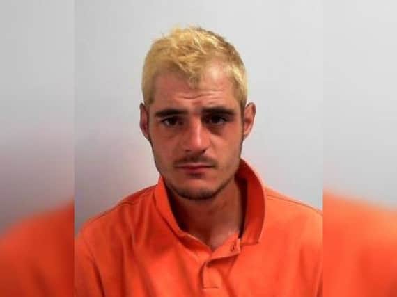 A Whitby man has been jailed for 22 weeks for stealing a bottle of vodka and assaulting a police officer while he was being arrested in Scarborough.