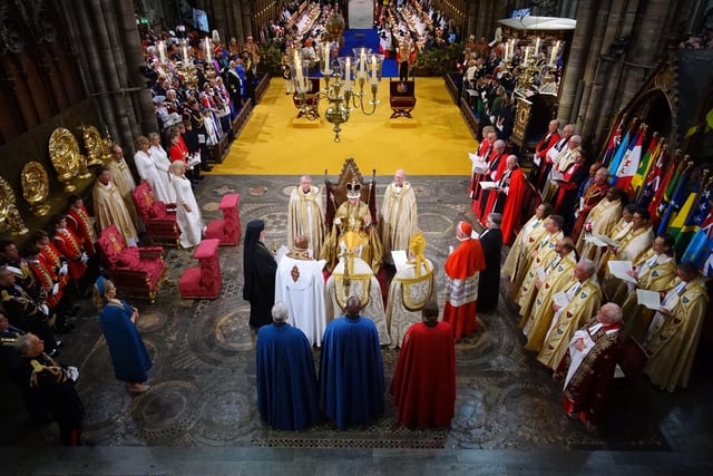 King Charles III after being crowned with St Edward's Crown by The Archbishop of Canterbury the Most Reverend Justin Welby during his coronation ceremony in Westminster Abbey.