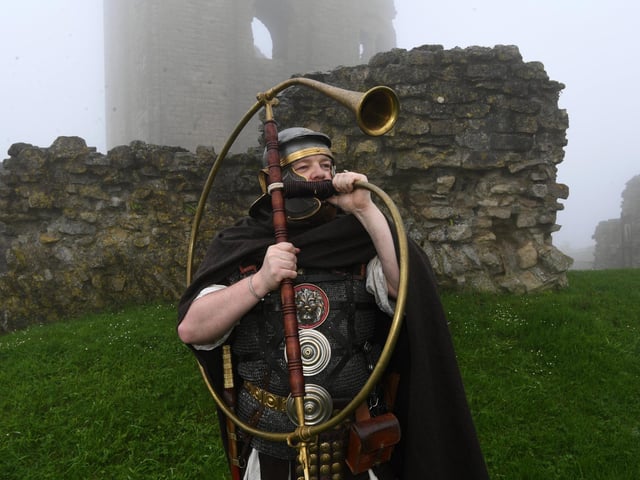 Big Day Out At Scarborough Castle -Legio VI Victrix Eboracum's Phil Clegg blows the horn
