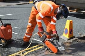 The council's highways maintenance staff trying out new electric, battery-powered tools on site.