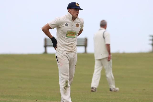 An Ebberston CC 2nds player in fielding action at Sewerby CC.