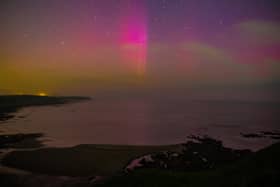 Stunning purple and pink Northern Lights seen from Scarborough's Jacksons Bay.