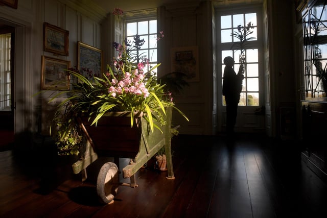 Head Gardener Jeremy Palmer is pictured getting arrangements ready.