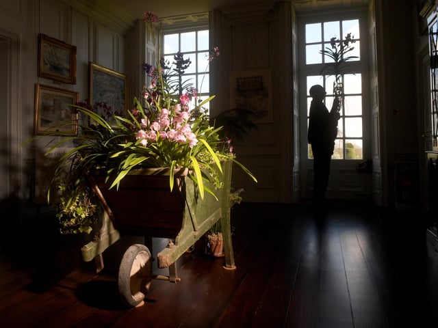 Head Gardener Jeremy Palmer is pictured getting arrangements ready.