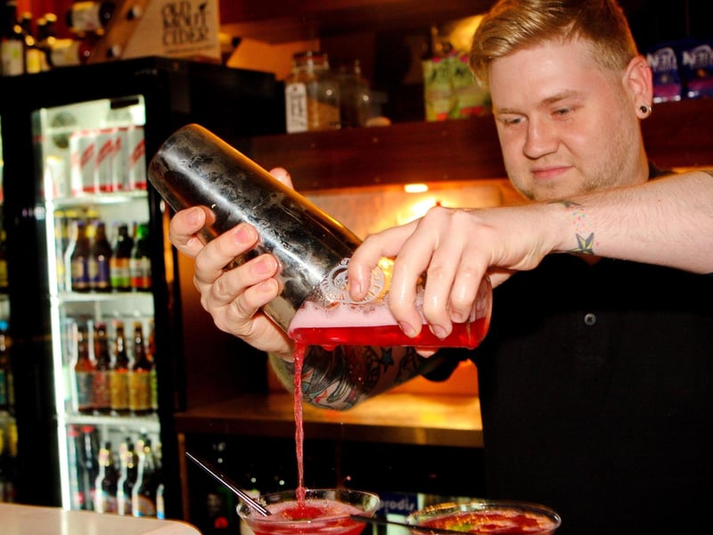 Top barman Danny Millar making some extravagent cocktails in Blue Lounge