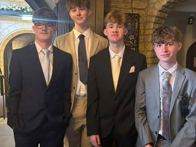 Looking very smart in their suits.