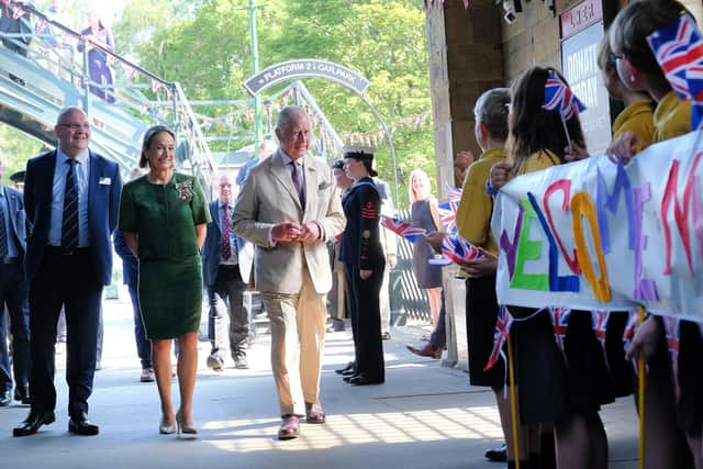 King Charles is welcomed by the children of Gillamoor School