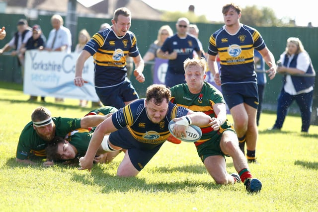 Bridlington RUFC try to shake off Selby to score a try.