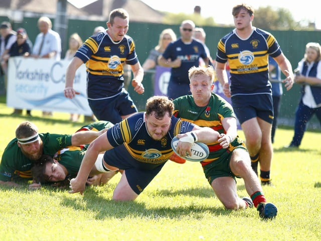 Bridlington RUFC try to shake off Selby to score a try.