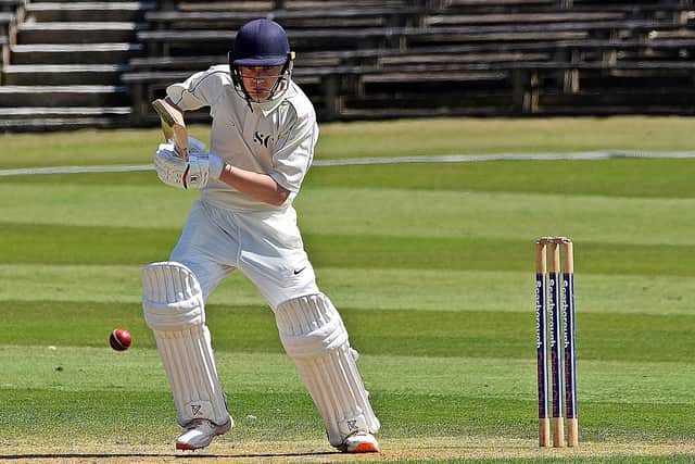Ben Squires works the ball through the offside during his sparkling 50no for the home side.