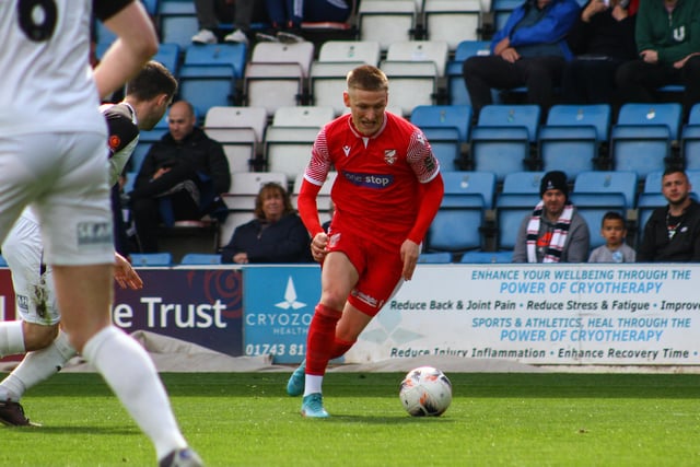 Danny Greenfield on the attack for the visitors.