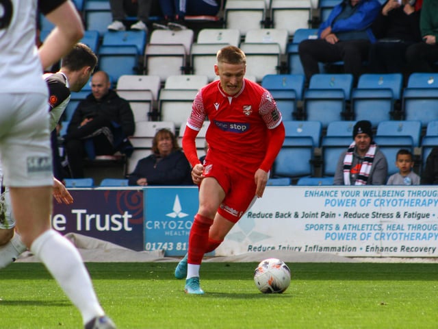 Danny Greenfield on the attack for the visitors.