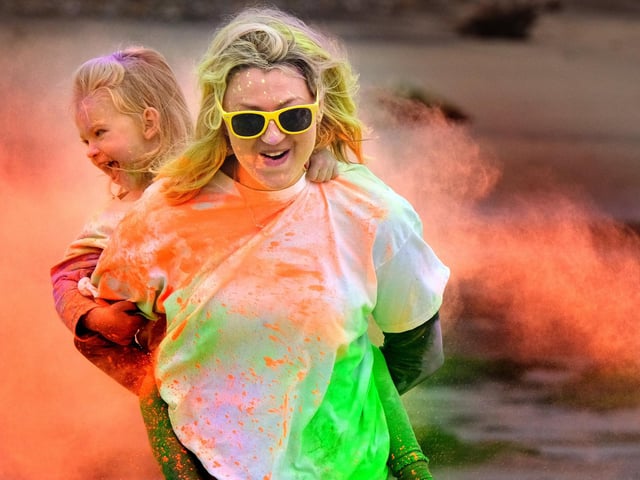 Family fun as the colours are sprayed.