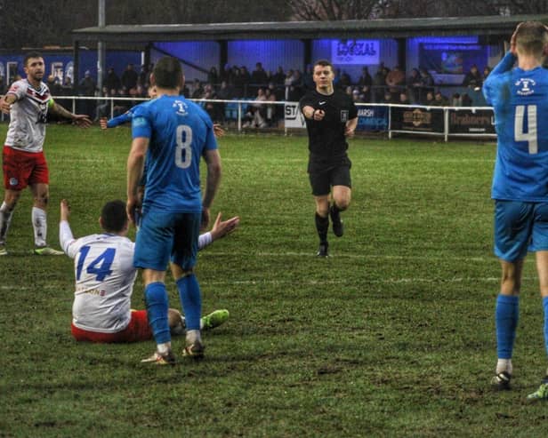 Whitby Town's Nathan Thomas is fouled for the visitors' penalty, with Jacob Gratton missing from the spot. PHOTOS BY WHITBY TOWN FC