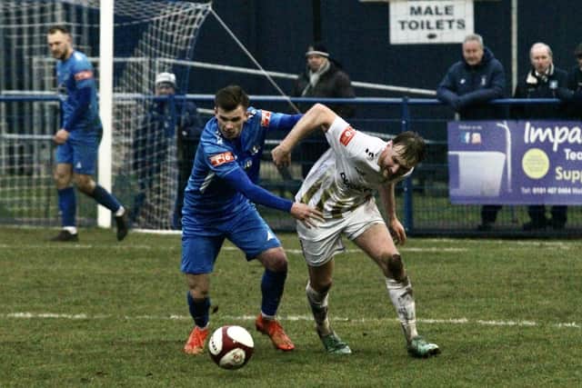 Brid Town battle for the ball at Dunston. Photo by Alexander Fynn