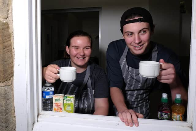 Tilly Grunwell and Dan Green raising cash for a charity trip to Cambodia.
picture: Richard Ponter