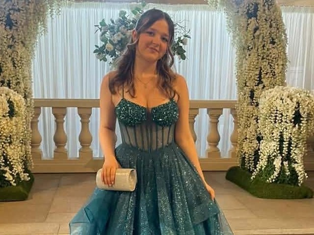 Looking stunning in a sparkly dress!