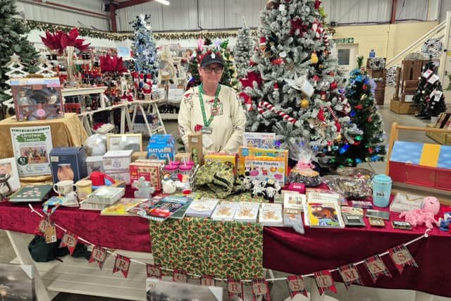 Sarah Moore with her fundraising festive tombola at Dean’s Scarborough