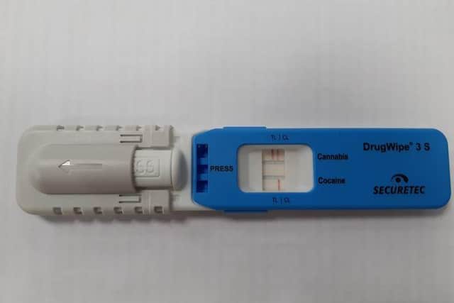 A routine police stop for a broken headlight led to a driver being taken into custody after testing positive for cannabis.