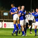 Whitby Town players celebrate their leveller at home to Marine.