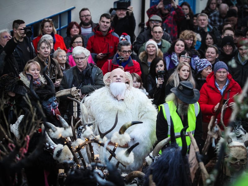 A crowd assembles at the bottom of Whitby's 199 Steps to watch the Krampus Run.
Picture: Ceri Oakes