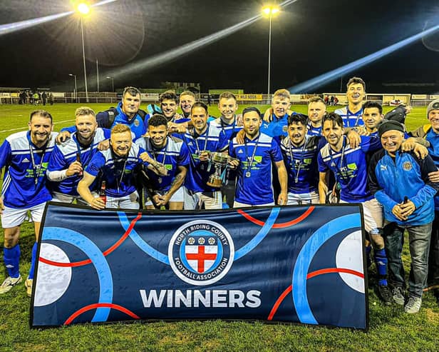 Trafalgar celebrate their North Riding FA Sunday Challenge Cup final win against Fox Covert