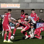 The two sets of players get stuck in during the Bank Holiday Monday clash, which saw Darlington win 5-2 at Scarborough Athletic PHOTOS BY RICHARD PONTER