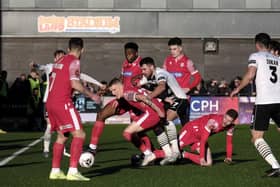 The two sets of players get stuck in during the Bank Holiday Monday clash, which saw Darlington win 5-2 at Scarborough Athletic PHOTOS BY RICHARD PONTER