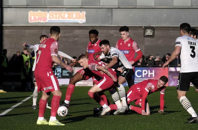The two sets of players get stuck in during the Bank Holiday Monday clash, which saw Darlington win 5-2 at Scarborough Athletic PHOTOS BY RICHARD PONTER