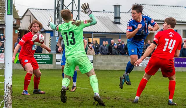 Harrison Beeden scores the last-minute winner for Whitby Town at home to Warrington Rylands on Saturday PHOTOS BY BRIAN MURFIELD