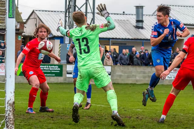 Harrison Beeden scores the last-minute winner for Whitby Town at home to Warrington Rylands on Saturday PHOTOS BY BRIAN MURFIELD