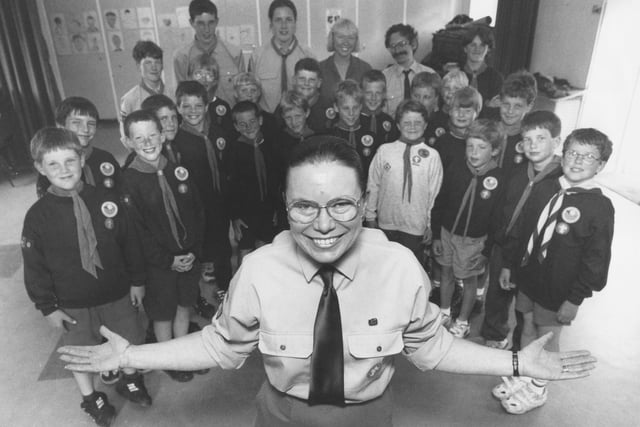 Scout leader Margaret Temlett, centre, was retiring from Hunmanby First Scout Group after 18 years' service in July 1997. She is pictured with her group. 