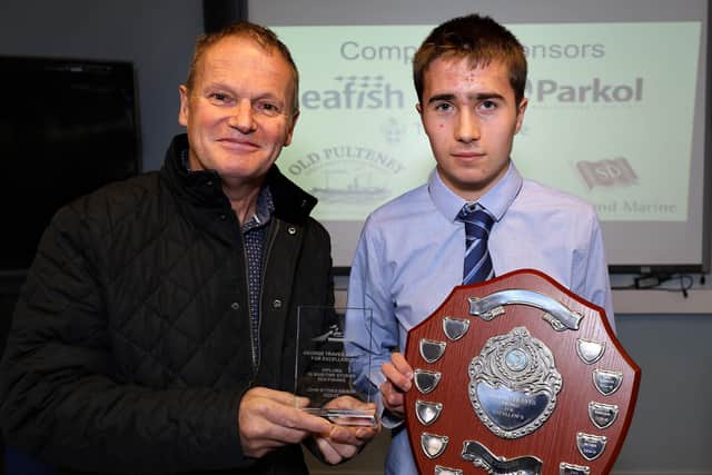 Chris Traves presents Whitby's John Sythes Ebison with his award.
picture: Richard Ponter