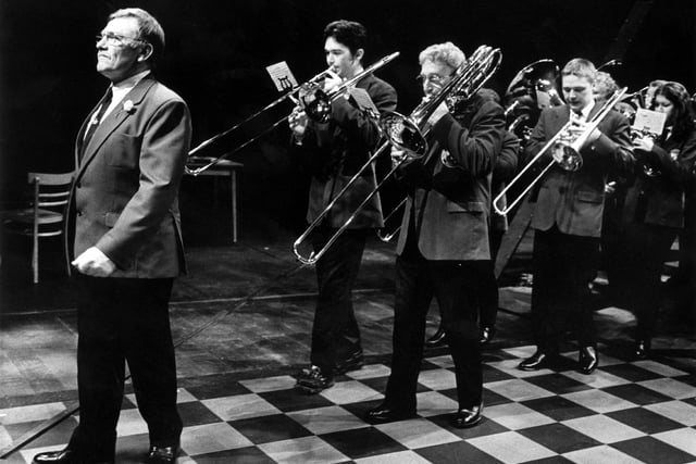 The world stage premiere of Brassed Off at the Crucible Theatre, Sheffield, March 13 to April 4, 1998. Peter Armitage, playing Danny, and members of Ward's Brewery Band on stage
