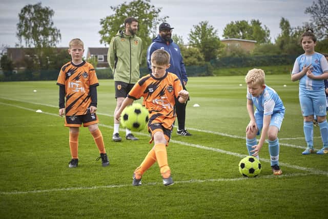 Children from Filey Holt FC Under 9s and Gilberdyke Phoenix Under 9s showing off their skills. Pictures by R&R Studio