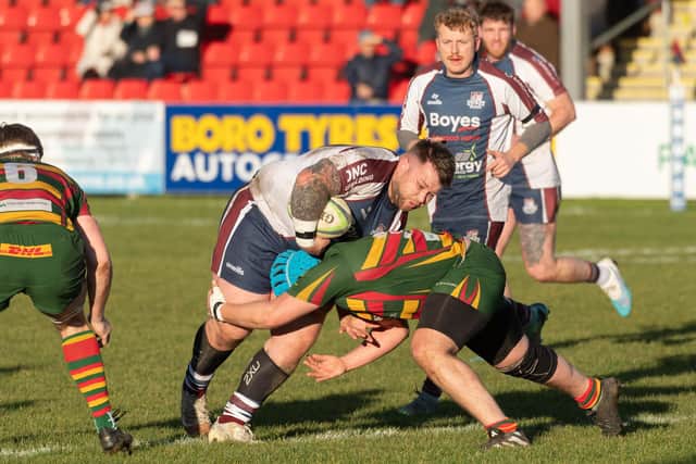 Benny Blackall powers on for Scarborough against Selby.