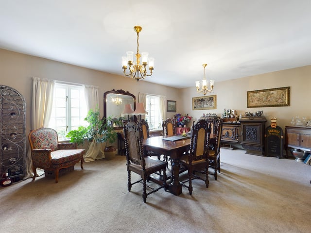 This dining room can accommodate a large party of people.