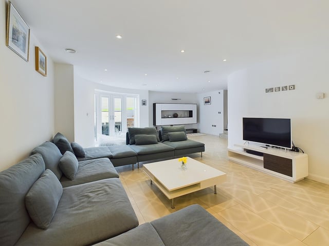 Versatile living space within the four-floor property.