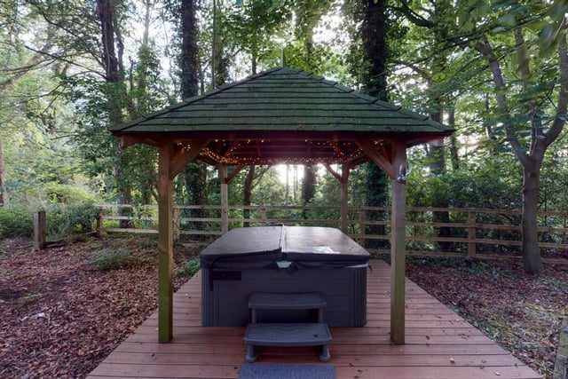 Space for a hot tub among the trees.