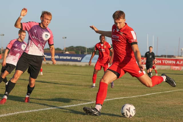 Toby Marriott fires at the Whitby Town goal. Photo by EC Media