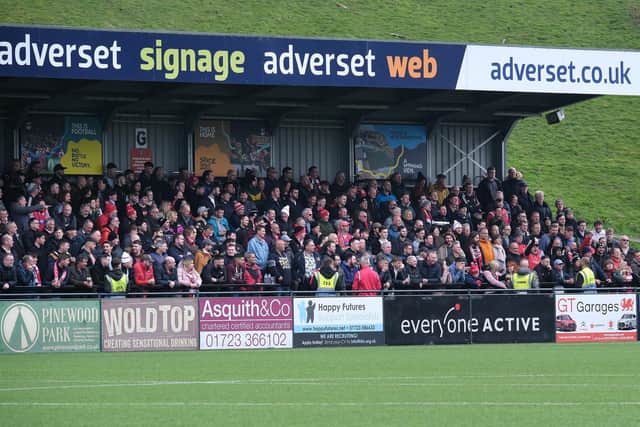 Scarborough Athletic fans take in the action against Banbury United.