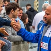 Blues boss Nathan Haslam thanks the Whitby Town fans at the end of a game last season.