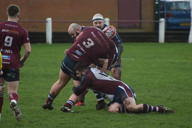 Billy Parker and Jake Lyon tackling for the visitors in Saturday's match.