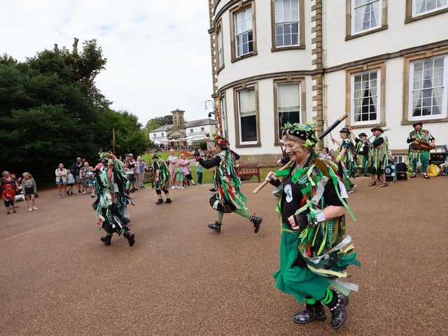 Morris Dancers entertain the visitors.