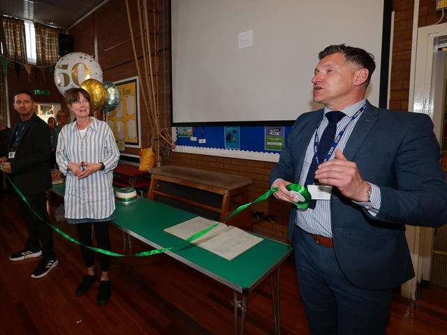 Head teacher Simon England addresses the audience